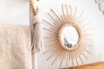 Lustro z rattanu w kształcie słońca