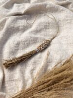 chwost dekoracyjny z muszelek kauri