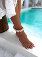 bransoletka muszelki kauri brązowa na kostkę